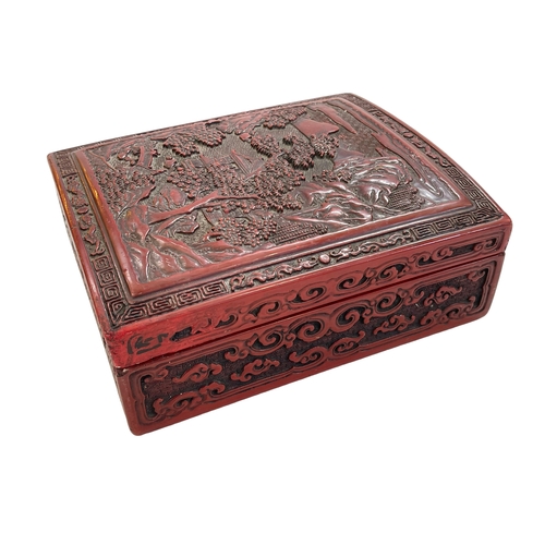 139 - Carved Chinese box 'Cinnabar Qing Dynasty', 29cm by 24cm.