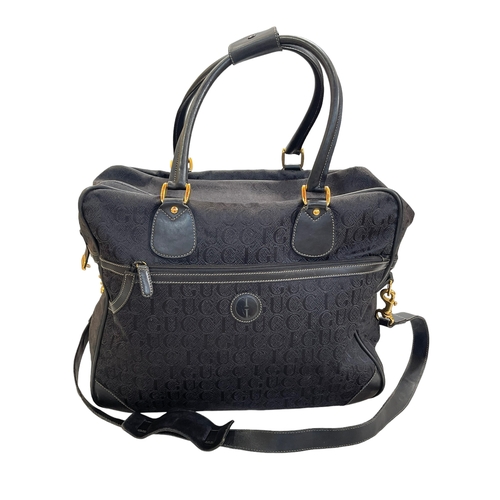 144 - Black Gucci holdall bag.