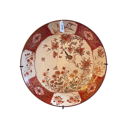 175 - Japanese charger decorated with bird in floral landscape, 36cm diameter.