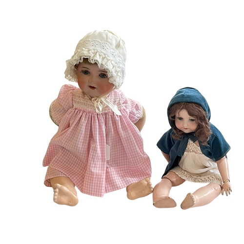 177 - Two Armand Marseille bisque head dolls.