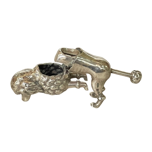 217 - Novelty silver 'Poodle' cigar cutter, London 1968, 5.75cm length.