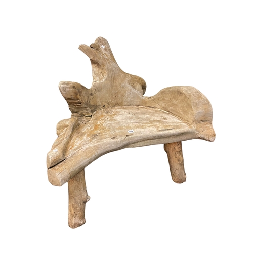 284 - Naturalistic arboreal garden seat, 84cm by 96cm.