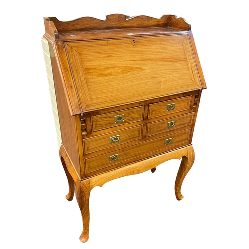 298 - Hardwood and brass inlaid five drawer bureau on cabriole legs, 110cm by 69cm by 34cm.