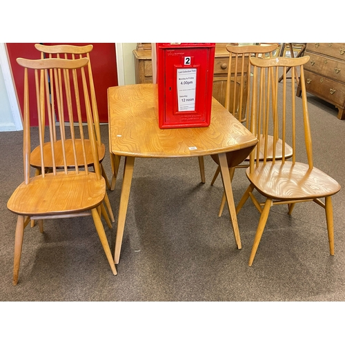 300 - Vintage Ercol elm drop leaf dining table and four Ercol Goldsmith dining chairs.