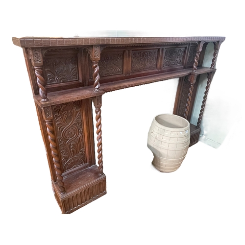 318 - Carved oak and barley twist column fire surround, 129cm by 191.5cm by 22.5cm.