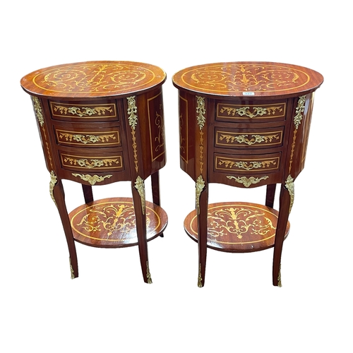 327 - Pair Continental inlaid oval three drawer pedestals, 76cm by 46.5cm by 37cm.