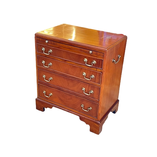 336 - Polished mahogany chest of four long graduated drawers with leather inset slide, 70cm by 60cm by 38c... 