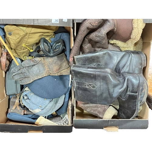 35 - Two boxes of military items including bomber jacket, boots, RAF uniform by H. Edward & Sons Ltd, Pri... 
