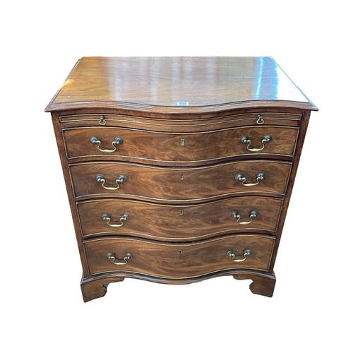 352 - Georgian style mahogany serpentine front chest having brush slide above four long graduated drawers ... 