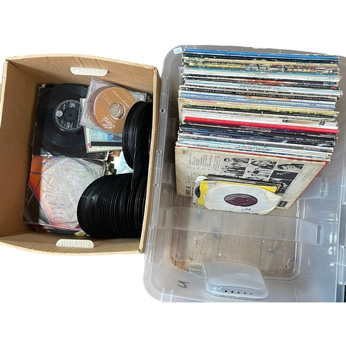 36 - Two boxes of LP and single records including Beatles, Rolling Stones, Jimi Hendrix, Queen, Abba, etc... 