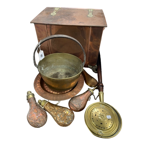 45 - Art Nouveau brass and copper two handle coal box, three powder flasks, jam pan, etc.