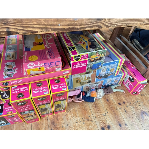 52 - Good collection of boxed Pedigree Sindy accessories including two houses, camping buggy and foldaway... 