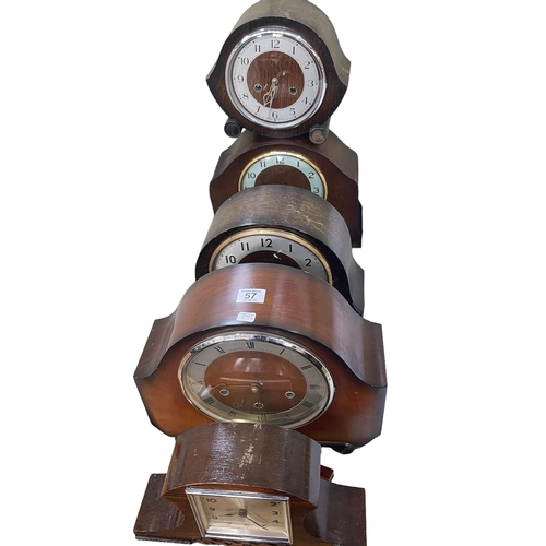 57 - Five vintage mantel clocks.