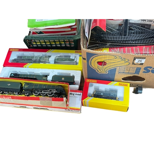 26 - Model railway engines, track, books and accessories.