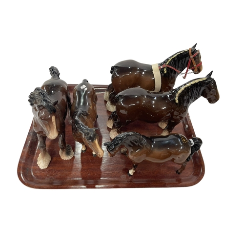 6 - Four Beswick horses including two Shires and Royal Doulton Shire Horse.