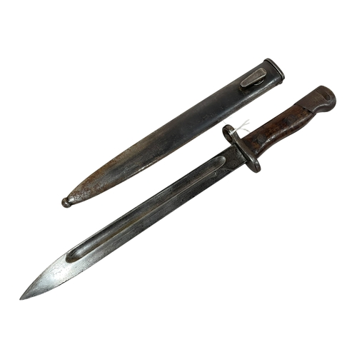 109 - Islamic / Turkish? dagger and scabbard. Blade is 25cm.