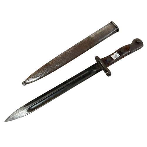 109 - Islamic / Turkish? dagger and scabbard. Blade is 25cm.