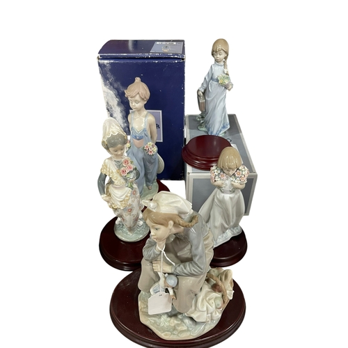 15 - Five Lladro figures including Girl with Doll, with three boxes.