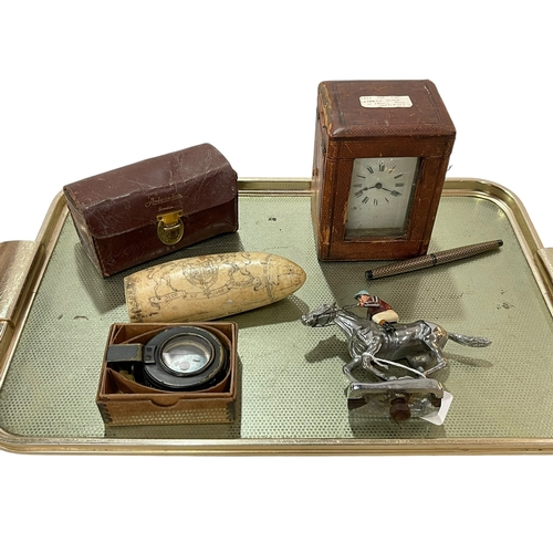 2 - Tray lot with French carriage clock, steeplechase car mascot, reel, compass, pen and replica scrimsh... 