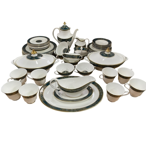 32 - Royal Doulton Carlyle tea and dinner service, approximately 50 pieces.