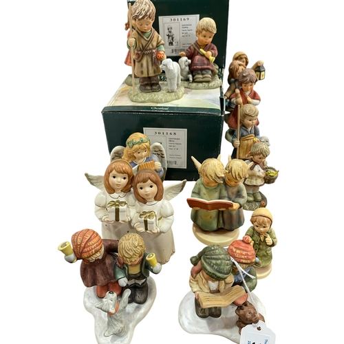 33 - Collection of Berta Hummel, two Hummel and two Goebel figures including 'Shepherd Girl with Recorder... 