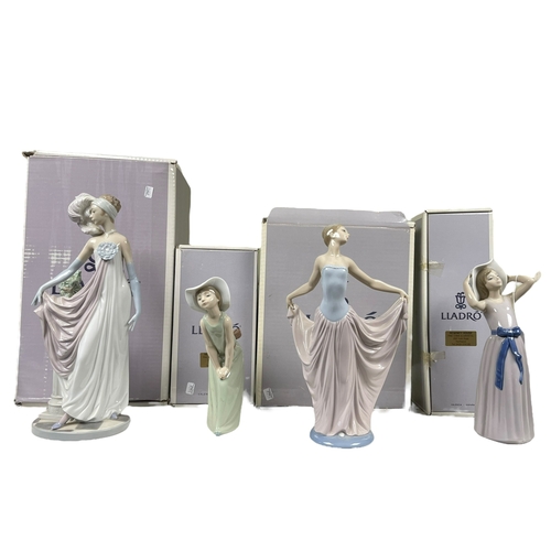 40 - Four boxed Lladro figurines including 5283, 5050, etc.