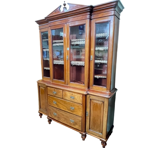 417 - Victorian mahogany breakfront cabinet bookcase having four glazed doors above two short and two long... 