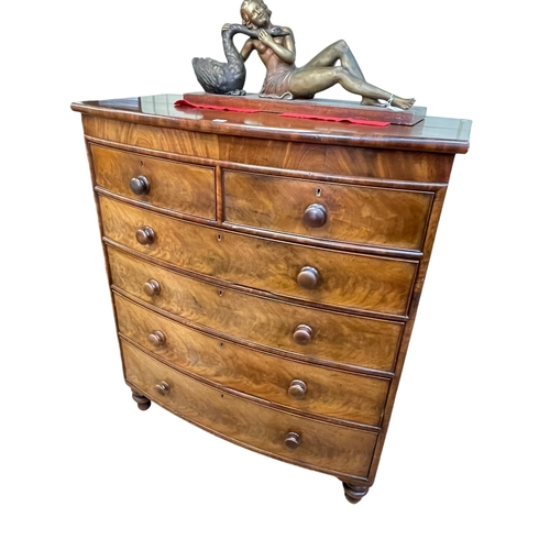 418 - Victorian mahogany bow front chest of two short above four long graduated drawers on turned legs, 13... 