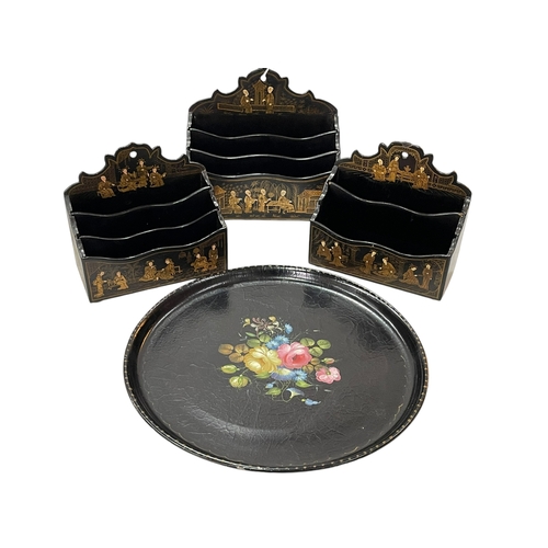 7 - Three chinoiserie papier mache letter racks and circular tray (4).