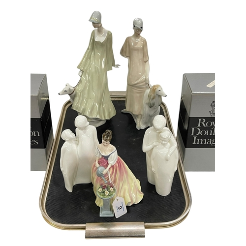 9 - Five Royal Doulton figures: two large 'Reflections', two 'Images' and 'Alexandra'.