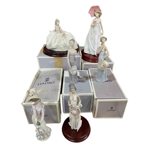 14 - Six Lladro figures including At the Ball, Woman, and Afternoon Promenade, with five boxes.