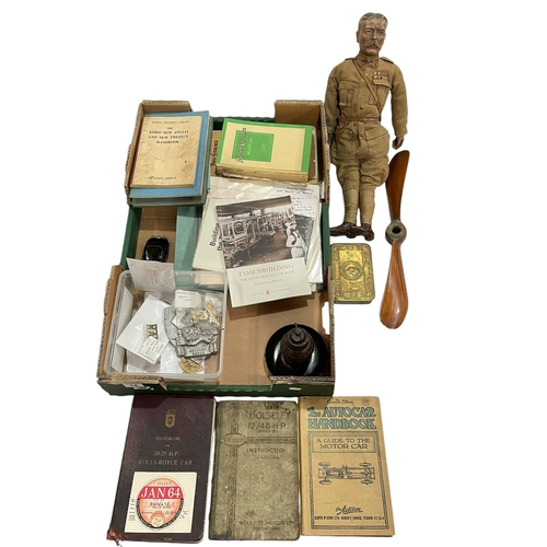 14 - Trench Art propeller and ashtray, Christmas tin, Kitchener doll, assorted motoring books including R... 