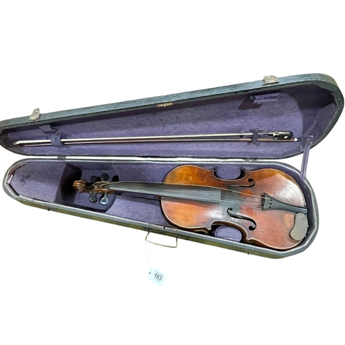 163 - Antique violin and bow with label 'Antonius Strad Cremona Facibat Annon 1690'.