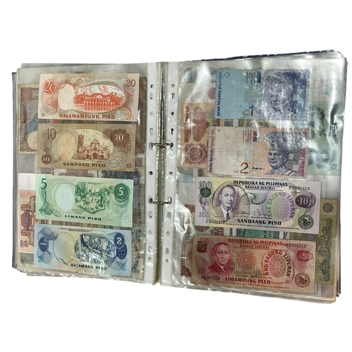 165 - Album of Worldwide banknotes, approximately 300.