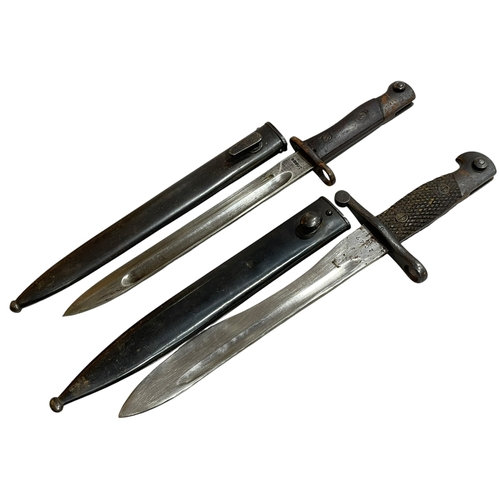 168 - Two kukri knifes, Islamic? bayonet and a Spanish bayonet marked 'Toledo' 2047 with scabbard.