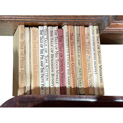 19 - Collection of nine John Beswick Beatrix Potter characters and fifteen books.