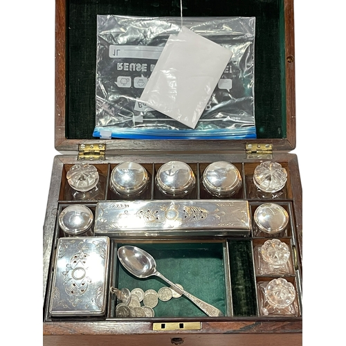 20 - Victorian rosewood fitted toilet box with bottles, silver spoon, coins.