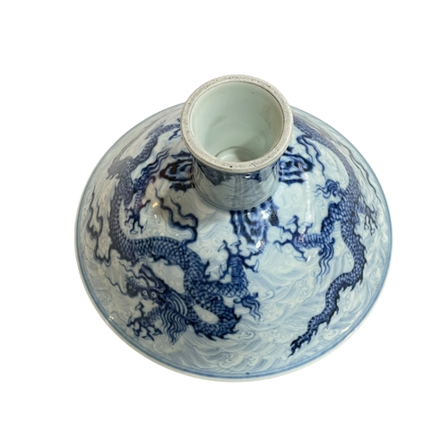 202 - Chinese blue and white stem bowl decorated with dragon and six character mark to the inner bowl, 10.... 