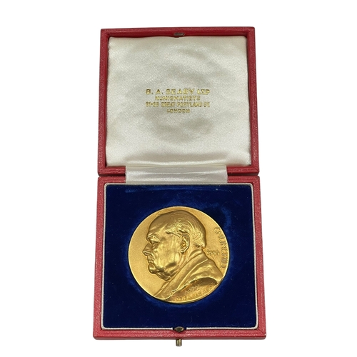 213 - A 1965 Churchill medal in 22 carat gold retailed by B.A. Seaby Ltd, medal depicting Churchill, with ... 