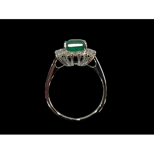 216 - 18 carat white gold rectangular cut emerald and diamond cluster ring, emerald 3.04 carats, diamonds ... 