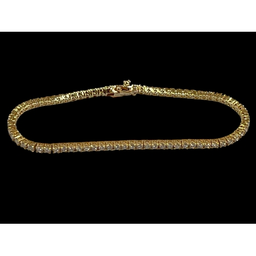 221 - Diamond tennis bracelet comprising over 70 diamonds set in 18 carat yellow gold, diamond 3 carats.