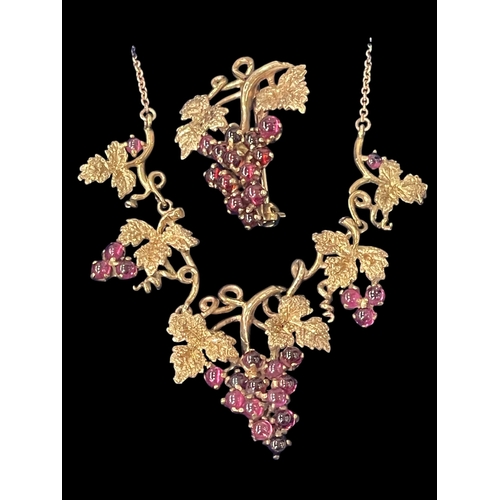 233 - Leaf and berry design 9 carat gold and gemstone necklace and matching brooch.