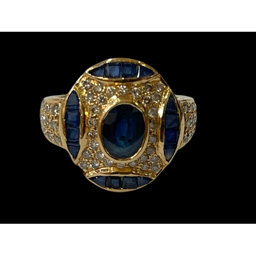 245 - Fancy design multi sapphire and diamond cluster ring in yellow gold (marks worn), size O.