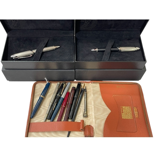 257 - Versace fountain and ballpoint pens, boxed, and collection of fountain pens, etc.