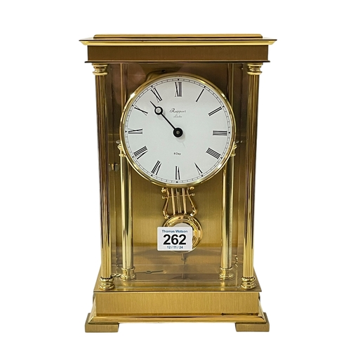 262 - Rapport brass four pillar mantel clock with enamel dial.