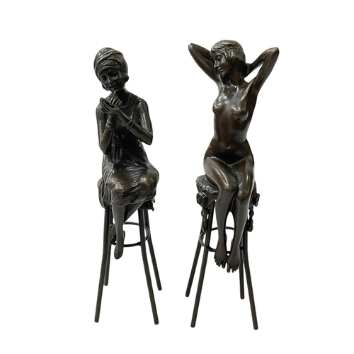 284 - Two French bronze sculptures of female figures on high stools, with seal mark Paris, 25cm.