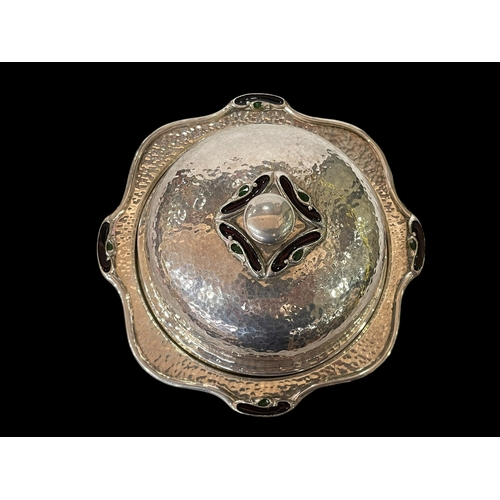 302 - Beaten pewter and enamel muffin dish, 18cm diameter.