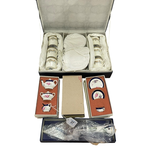 37 - Cased set of Aynsley 'Henly' coffee cans and saucers, dolls teaware and Royal Worcester trowel.