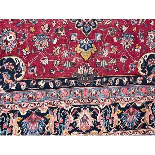 386 - Early 20th Century Persian carpet with central medallion 4.00 by 3.00.