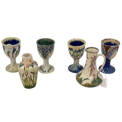 39 - Four Cobridge chalices including three Anita Harris, Hosta jug and Freesia vase.